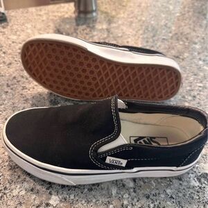 Vans Kids Slip-On Sneakers in Black and White